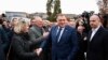 Milorad Dodik greets supporters in front of the court in Sarajevo on January 17. 