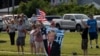 Supporters react as Trump Force One, carrying Republican presidential candidate and former U.S. President Donald Trump, lands in Milwaukee, Wisconsin, a day after he survived an assassination attempt at a rally in Butler, Pennsylvania.