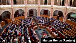 Hungarian news websites reported that parliament, dominated by nationalist Prime Minister Viktor Orban's Fidesz party, would further delay the vote after previously citing a deterioration in relations with Sweden.