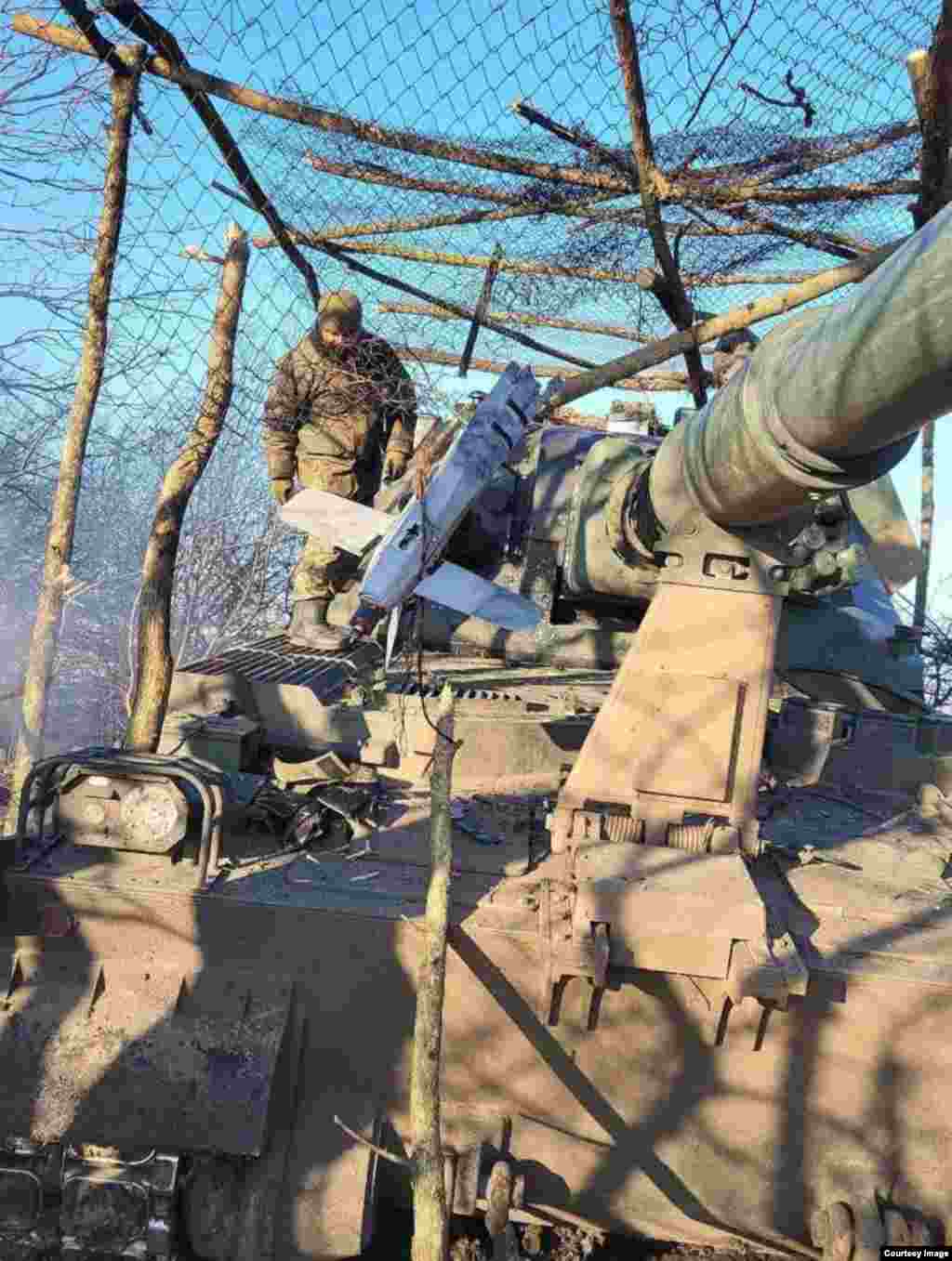 The cages have successfully foiled suicide drone attacks in some cases. This image shows the rear half of a Lancet that reportedly failed to detonate after slamming into makeshift protection around a Ukrainian Krab howitzer in January. 