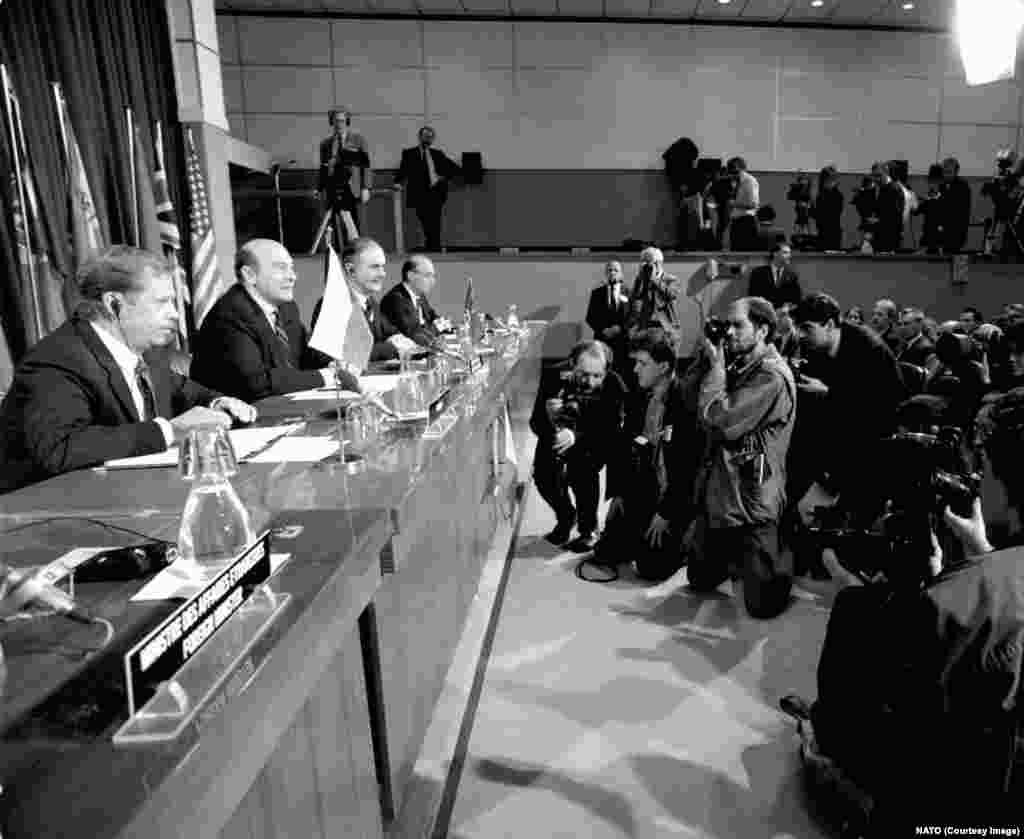 Czechoslovak President Vaclav Havel (left) on a visit to NATO Headquarters in Belgium in March 1991. With the Cold War won after 1991, existential questions about NATO’s future mounted. U.S. President George Bush remarked that, for a newborn peace, “the real danger came from a general sense of euphoria that everything was going swimmingly.” 
