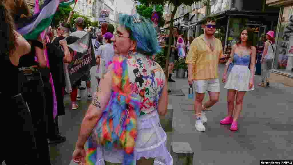 A person with a colorful outfit takes part in the parade. In April 2022, the country's Senate passed several bills banning gay "propaganda" in schools and the discussion of homosexuality and gender identity in public spaces. Several months later, over 15,000 people took to the streets of the nation's capital, calling for equal rights for gender and sexual minorities.