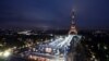 The Summer Olympics' opening ceremony lights up Paris and the Eiffel Tower on July 26.