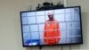 Vladimir Kara-Murza is shown on a video screen from his prison in Omsk at a hearing in June at which he requested permission to speak to his wife on their 20th wedding anniversary.