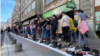 Sarajevans march in a silent tribute in April 2024 alongside shoes marking the victims of the three-year siege of Sarajevo from 1992 to 1996, a tragedy from which Sila's family fled.