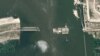A satellite image of the Kakhovka dam after it was breached.