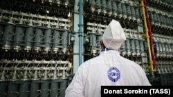A worker examines gas centrifuges at Uranium Enrichment Department 53 of the Ural Electrochemical Combine. (file photo)