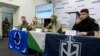 Representatives of the Free Russia Legion, the Siberian Battalion, and the Russian Volunteer Corps attend a press conference of pro-Ukrainian Russian paramilitary groups in Kyiv in March.