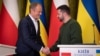 Ukrainian President Volodymyr Zelenskiy (right) meets in January with Polish Prime Minister Donald Tusk.