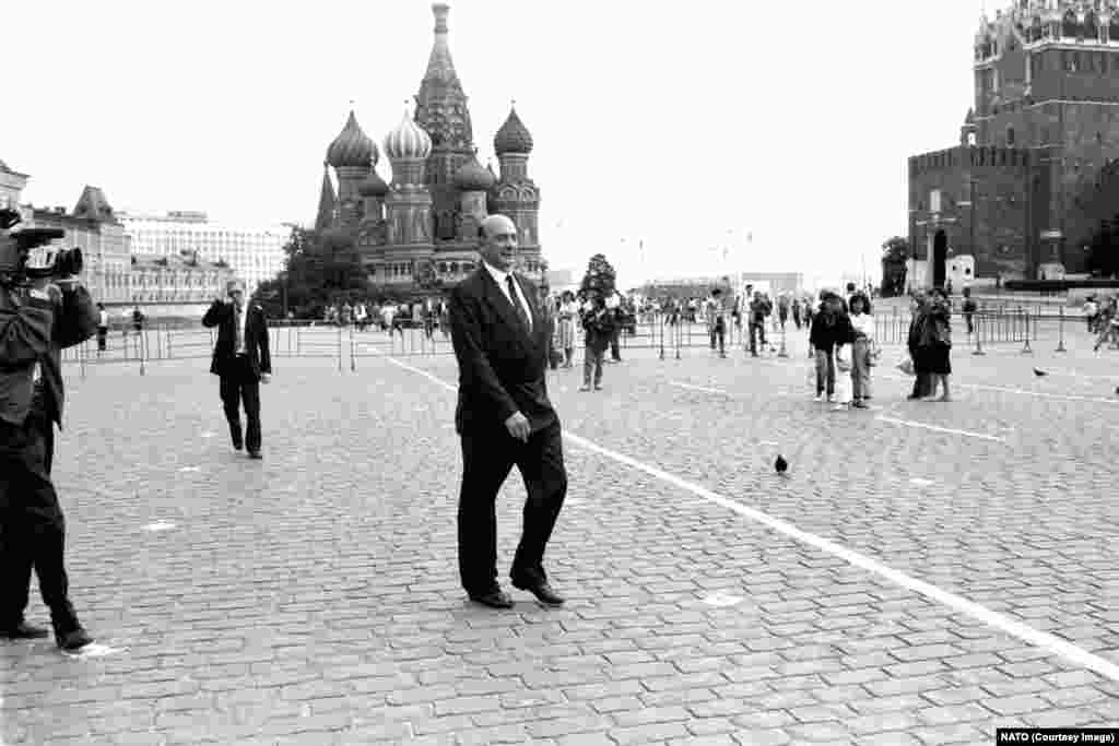 NATO’s Secretary-General Manfred Worner walks across Red Square during a visit to Moscow in July 1990. The seeds of a new rift between Moscow and the West were apparently sown when U.S. Secretary of State James Baker told the Soviet leadership in February 1990 that, "if the United States keeps its presence in Germany within the framework of NATO, not an inch of NATO’s present military jurisdiction will spread in an eastern direction.” That sentiment was repeated, though never formally agreed upon, by German Foreign Minister Hans-Dietrich Genscher.