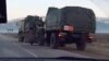 Як лаҳзаи берун бурдани техникаҳои пойгоҳи 201-ум аз Кӯлоб