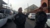 Правоохранители во время оперативных действий в ереванской общине Норк-Мараш, где были задержаны члены предполагаемой вооруженной группы, Ереван, 25 ноября 2015 г.