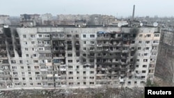 Поврежденные здания в Угледаре, Донецкая область, Украина, 27 января 2023 года