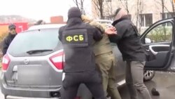 Сотрудники магаданского УФСБ, иллюстративное фото, скрин из оперативной съемки УФСБ