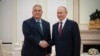 Hungarian Prime Minister Viktor Orban (left) meets with Russian President Vladimir Putin at the Kremlin in Moscow, in a handout picture released by Orban's office on July 5.