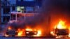 Vehicles blaze following a Russian strike on an industrial district of Zaporizhzhya, Ukraine, on January 8.