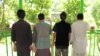 FILE: Insurgent fighters captured by the police in Kapisa