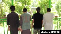 FILE: Insurgent fighters captured by the police in Kapisa