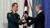 Директор національної гвардії Росії Віктор Золотов і російський президент Володимир Путін. Москва, 27 березня 2017 року 
