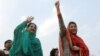 FILEMaryam Nawaz (R), daughter and Kulsoom Nawaz (L) wife of former Pakistan's premier Nawaz Sharif wave to supporters.