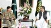 Pakistani Prime Minister Shahid Khaqan Abbasi (R) talks with U.S. Centcom commander, General Joseph Votel, in Islamabad on August 19.