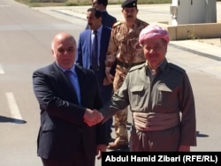 Kurdish leader Masud Barzani (right) with Iraqi Prime Minister Haidar al-Abadi in 2015