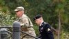 U.S. Army Sergeant Bowe Bergdahl, right, arrives at the court house for a hearing in the case of United States vs. Bergdahl in Fort Bragg, North Carolina, on October 16.