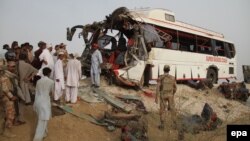 FILE: The aftermath of a traffic accident in southren Pakistan.