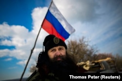 Bratislav Zivkovic, head of the Serbian Chetnik paramilitary group, at a Russian checkpoint in Crimea in 2014.