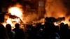 Fires burn during unrest in the Harehills district of Leeds on July 18. 
