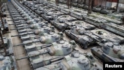Dozens of the Leopard tanks are seen in a hangar in Tournais, Belgium, in January.
