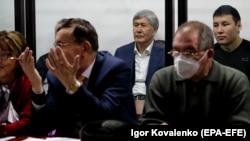Former Kyrgyz President Almazbek Atambaev (center) in court in Bishkek in November.