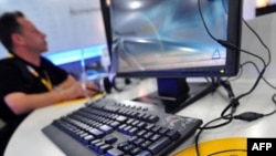 An accredited member of the media online at the Main Press Center for the Beijing Olympic Games