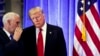 Обраний президент США Дональд Трамп (п) та майбутній віце-президент Майк Пенс перед початком прес-конференції. Нью-Йорк, 11 січня 2017 року
