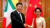 Liderka Mjanmara Aung San Suu Kyi, koja je trenutno u kućnom pritvoru, prilikom susreta sa Xi Jinpingom, predsednikom Kine 18. januara 2020 u glavnom gradu Mjanmara Najpidu. 