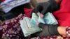 Uzbekistan has been hit hard by the fall in oil prices and remittances from foreign workers.