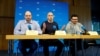 Russian activists Vladimir Kara-Murza (left), Andrei Pivovarov (center), and Ilya Yashin hold a news conference in Bonn on August 2 following their release from Russian captivity the previous day. 