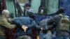 Law enforcement officers detain opposition supporters in Minsk, on November 29, 2020.