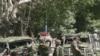 NATO soldiers secure the site of the attack on August 15