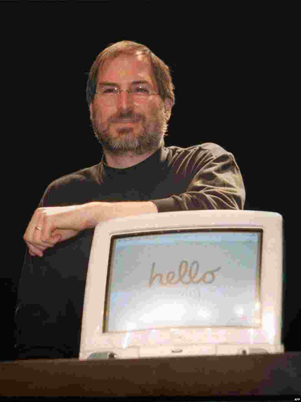 Jobs' return to Apple in 1997, nearly a decade after breaking with management, rejuvenated the company. Here, Jobs introduces iMac computers at "Apple Expo" in Paris, France in 1998.