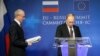 Герман Ван Ромпей, на той час голова Європейської ради та президент Росії Володимир Путін