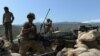 FILE: U.S. soldiers take up positions during an operation against the Islamic State (IS) militants in Nangarhar province.