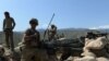 U.S. soldiers take up positions during an operation against IS militants in the Achin district of Nangarhar Province in April.