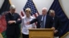 FILE: U.S. Senator John McCain (C) speaks at a press conference at Resolute Support headquarters in Kabul in July.