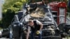 Мошини “Mercedes”-и Максим Шаповал дар як чорроҳаи Киев таркид 