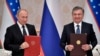 Президент России Владимир Путин и президент Узбекистана Шавкат Мирзиеев. 