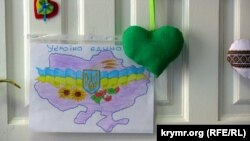 Иллюстрационное фото. Детский рисунок в лагере переселенцев