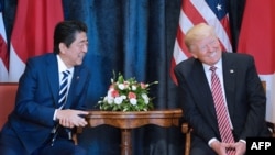 Дар остонаи нишасти G7 Трамп бо Абе гуфтугӯ анҷом дод