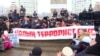 Protesters rally in Almaty on February 13 to demonstrate against human rights abuses during last month's unrest in Kazakhstan. 