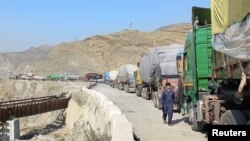 Trucks had been stranded for days at Afghanistan's Torkham border crossing into Pakistan.